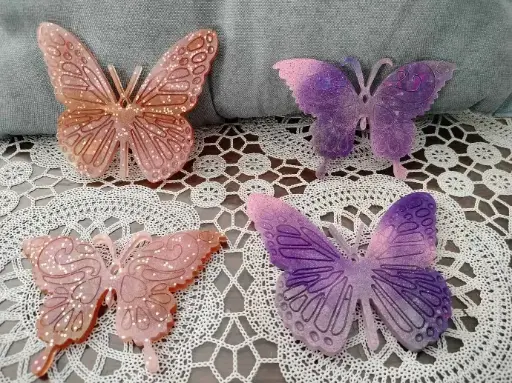 Paires de papillons en résine